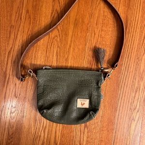 Meanwhile Back on the Farm Green pebble leather sling bag. Only used a few times